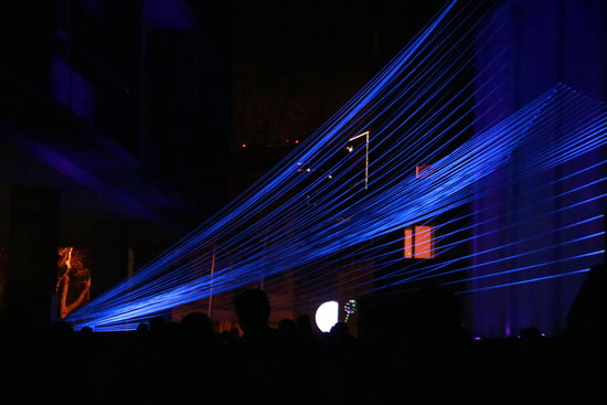 An art installation using string and blacklight in Barcelona on February 17 2019 (by Aina Martí)